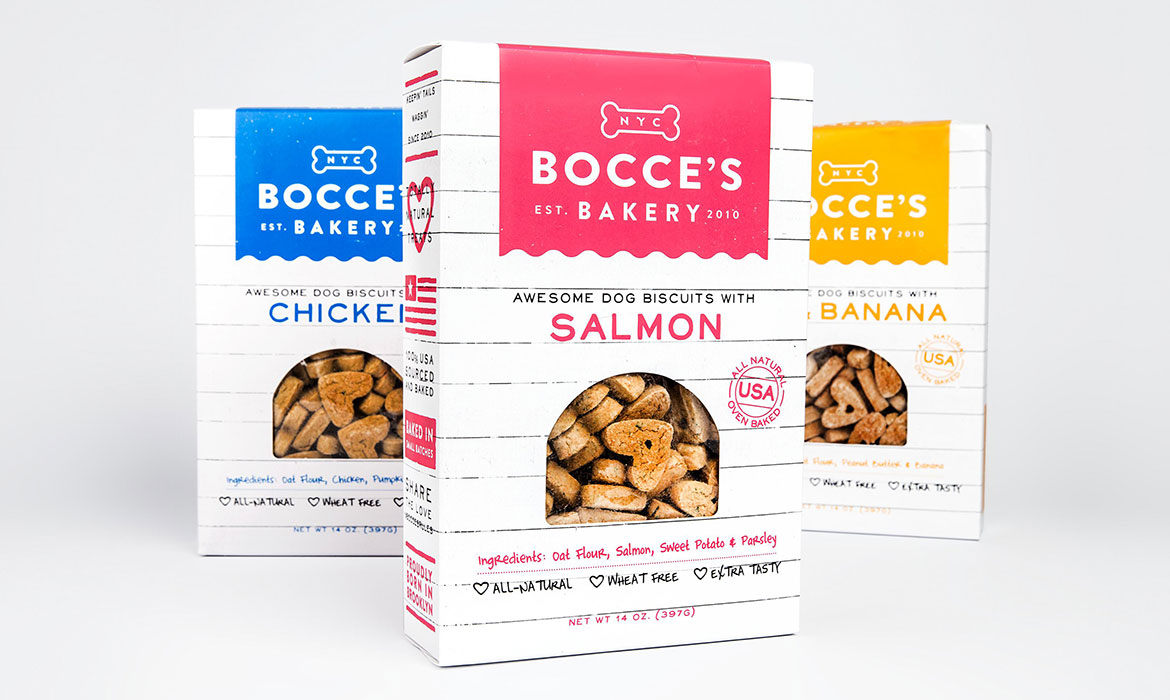 Three different flavors of dog biscuits are shown.